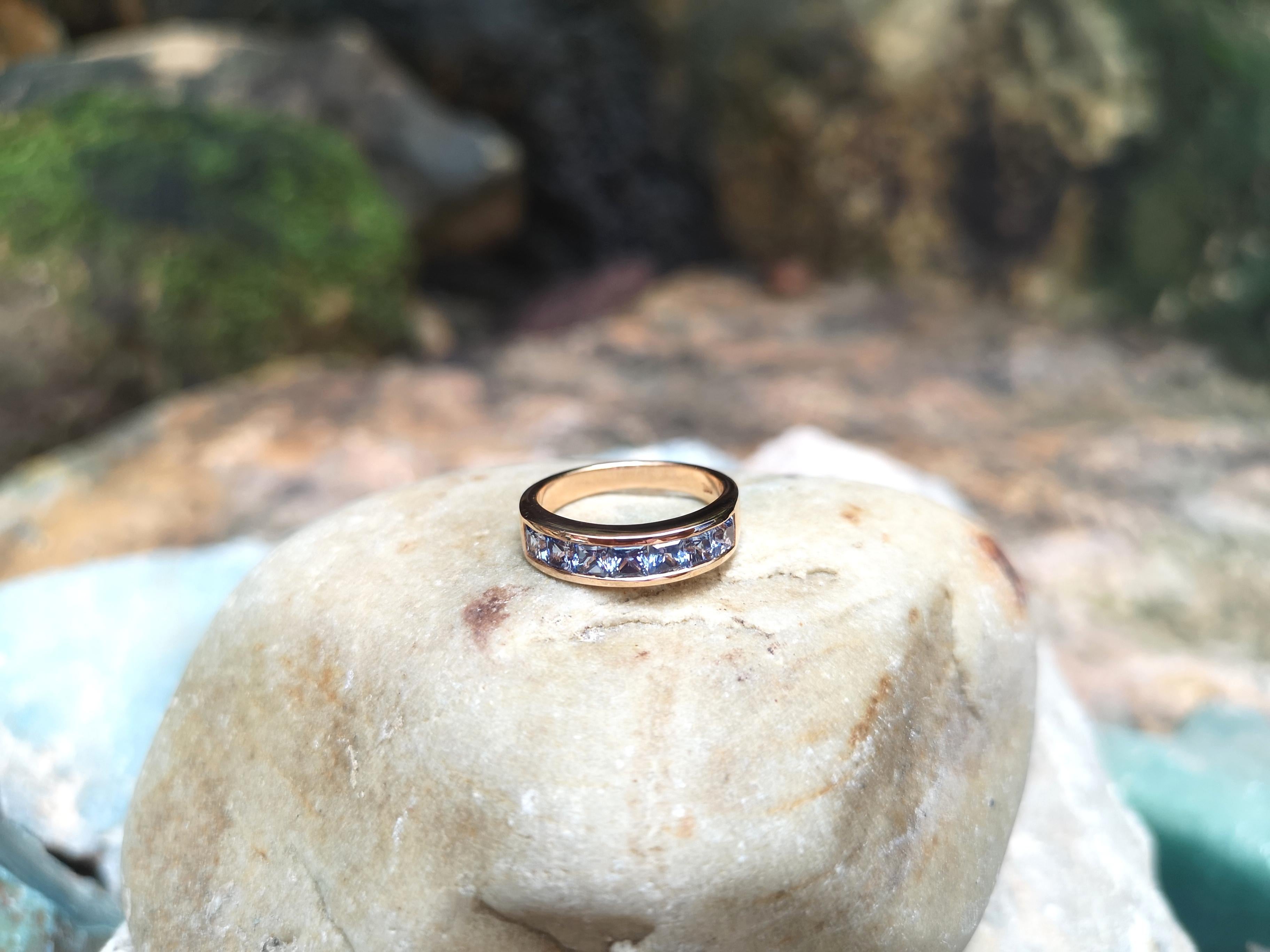 Contemporary Blue Sapphire Ring Set in 18 Karat Rose Gold Settings For Sale