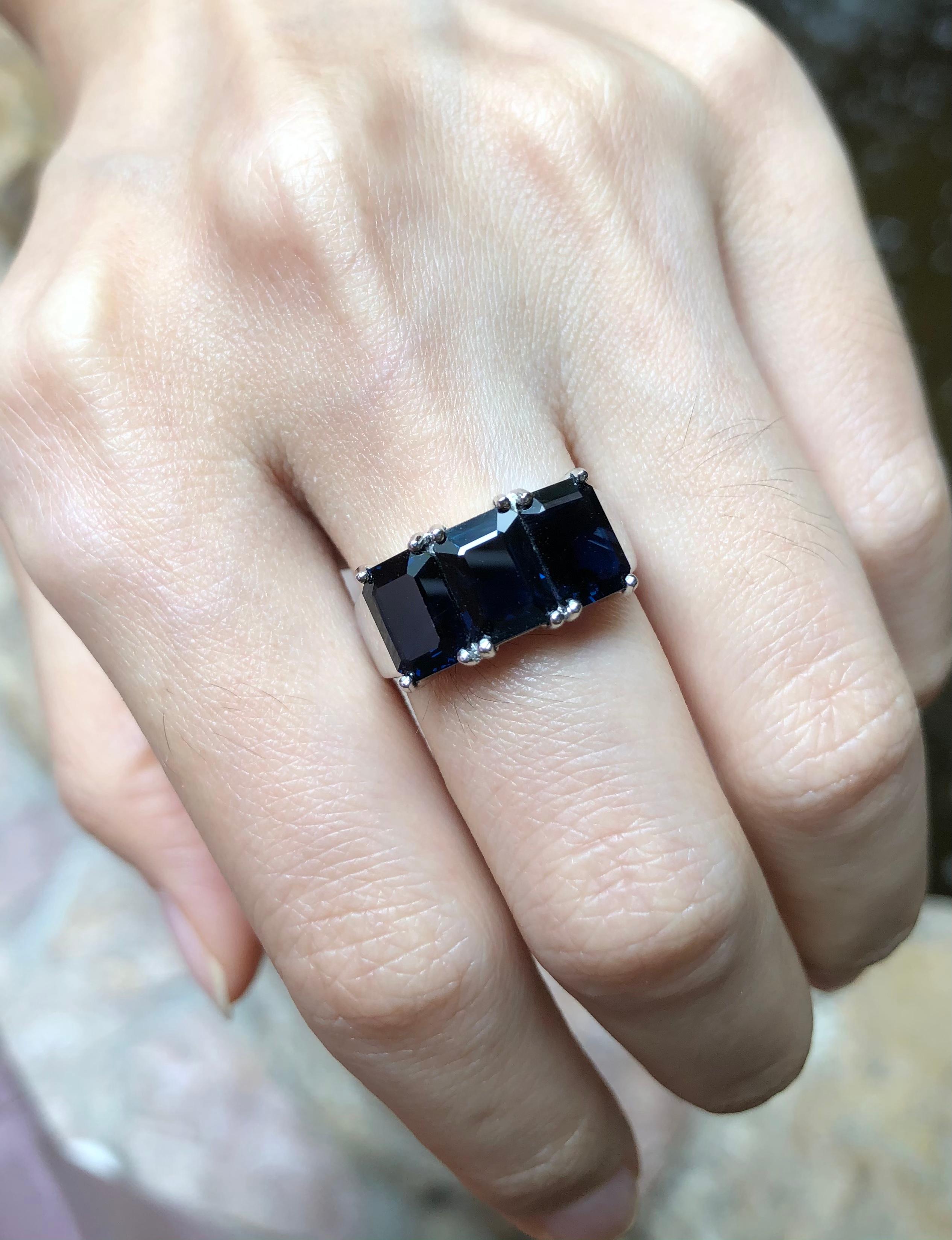 Emerald Cut Blue Sapphire Ring Set in 18 Karat White Gold Settings