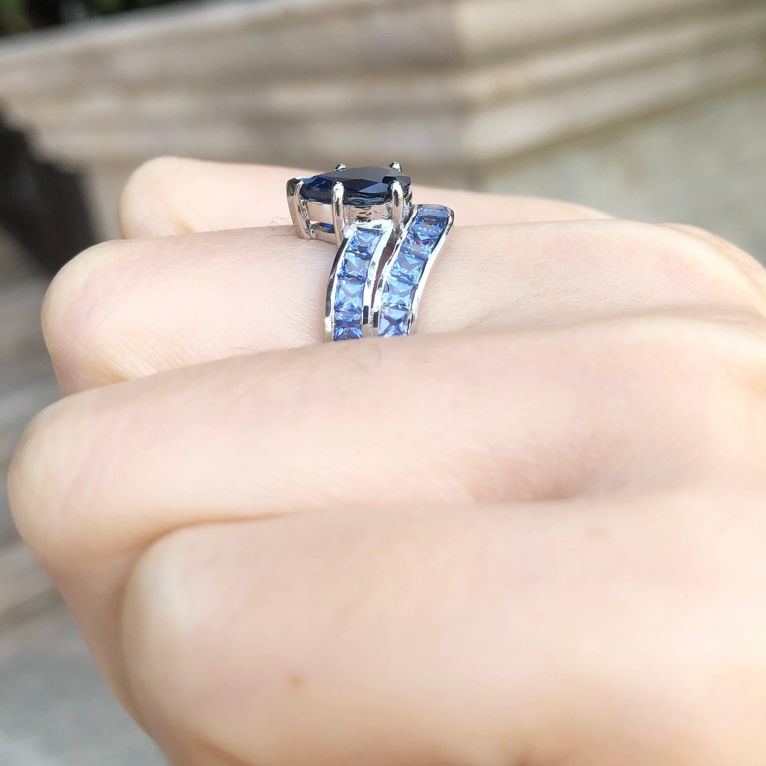 Mixed Cut Blue Sapphire Ring Set in 18 Karat White Gold Settings For Sale