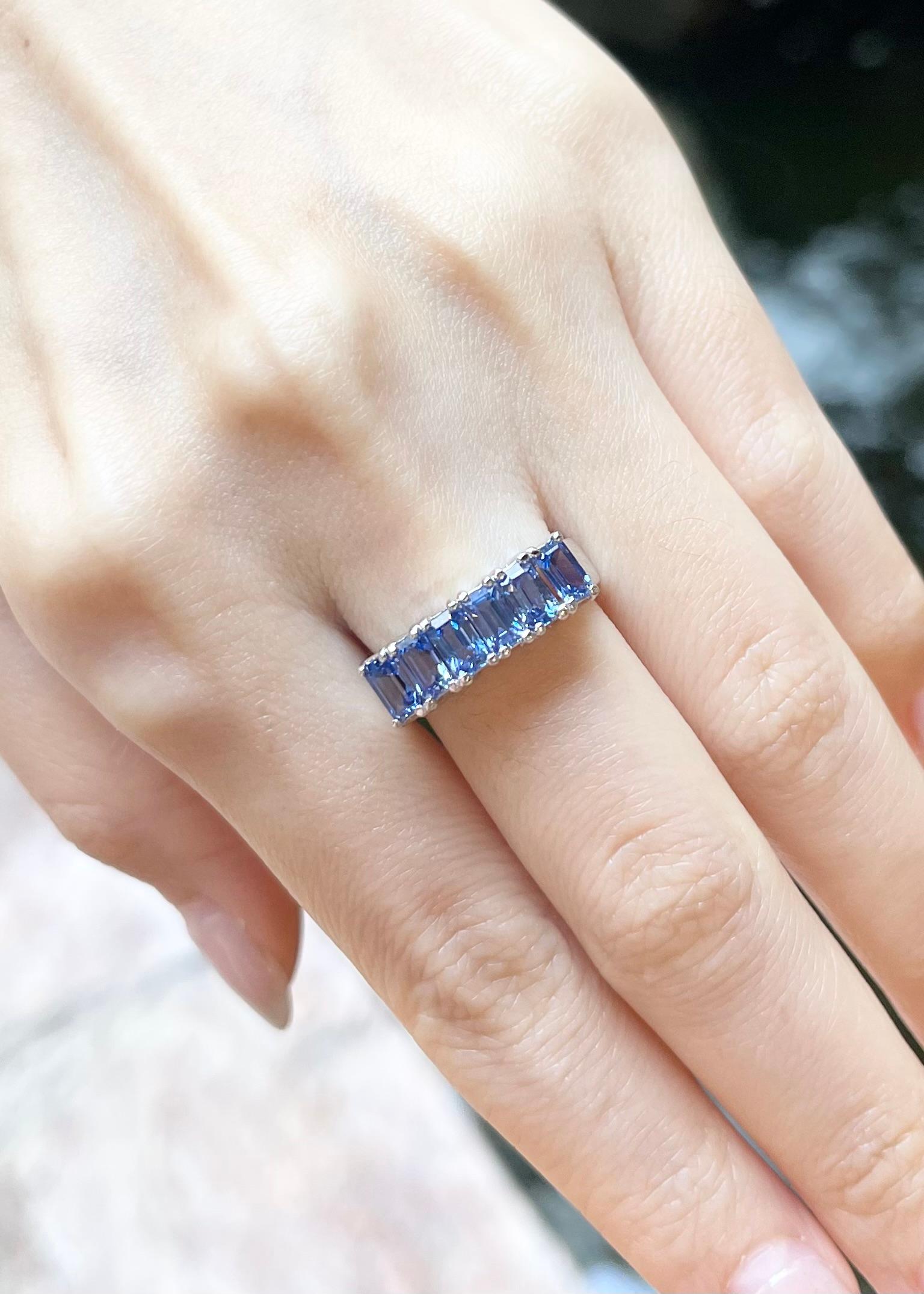 Emerald Cut Blue Sapphire Ring set in 18K White Gold Settings For Sale
