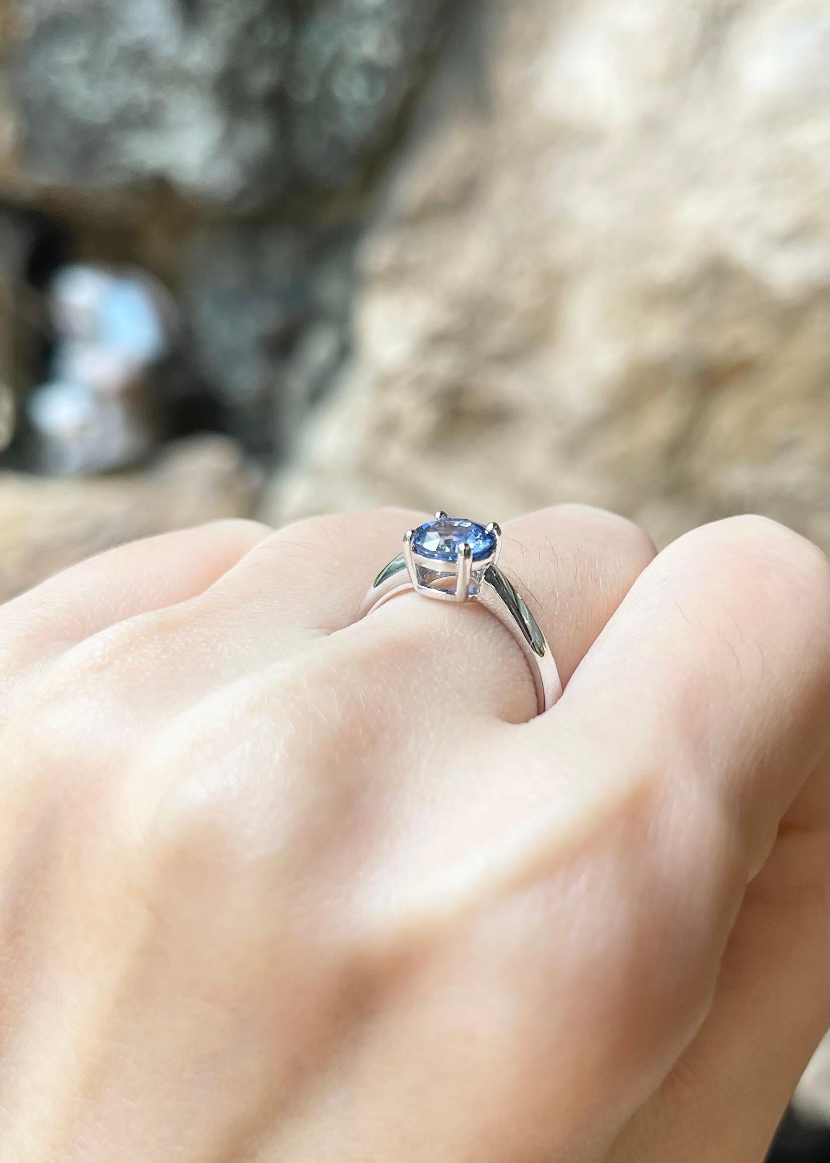 Women's Blue Sapphire Ring set in 18K White Gold Settings For Sale