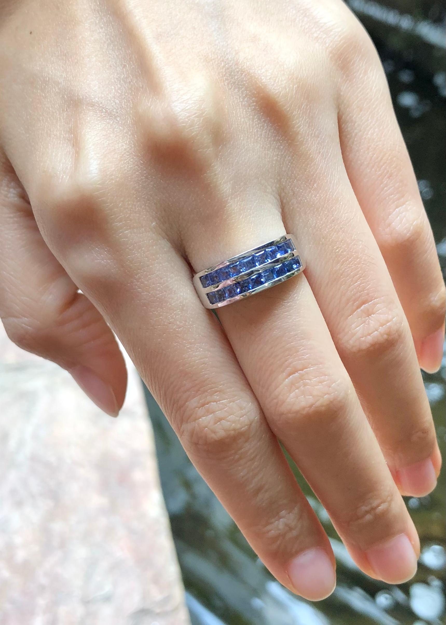 Blue Sapphire  Ring set in Silver Settings

Width:  1.8 cm 
Length: 0.7 cm
Ring Size: 55
Total Weight: 4.59 grams

*Please note that the silver setting is plated with rhodium to promote shine and help prevent oxidation.  However, with the nature of