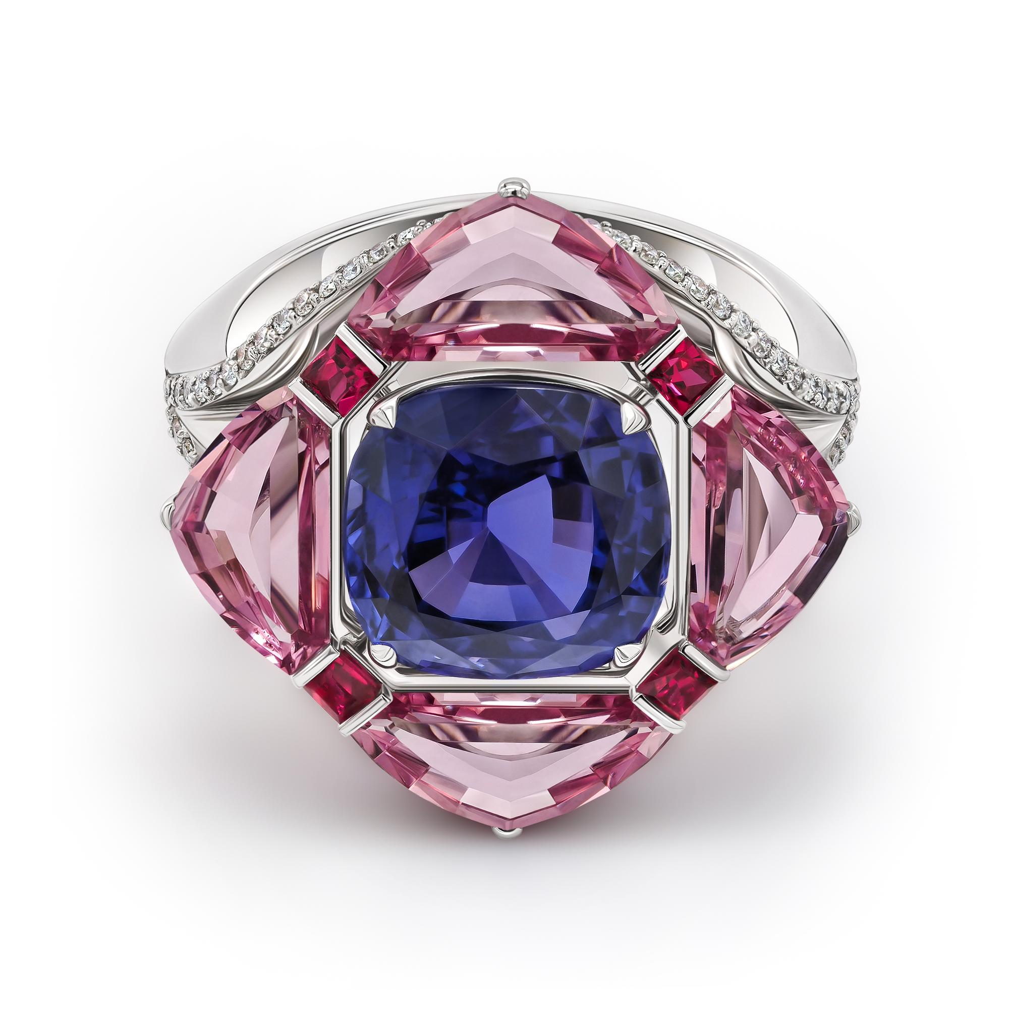 •	18k white gold Unheated blue sapphire in cushion cut total carat weight 5.15 surrounded by fancy cut pink spinels total carat weight 3.06. 
•	Spinels – 4 pink in fancy cut total carat weight – 3.06. 
•	Spinels – 4 red in square cut, total weight