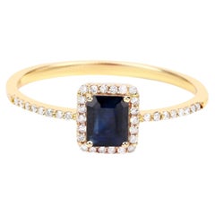 Anello con zaffiro blu e diamanti da 0,56 carati, in oro giallo 14K