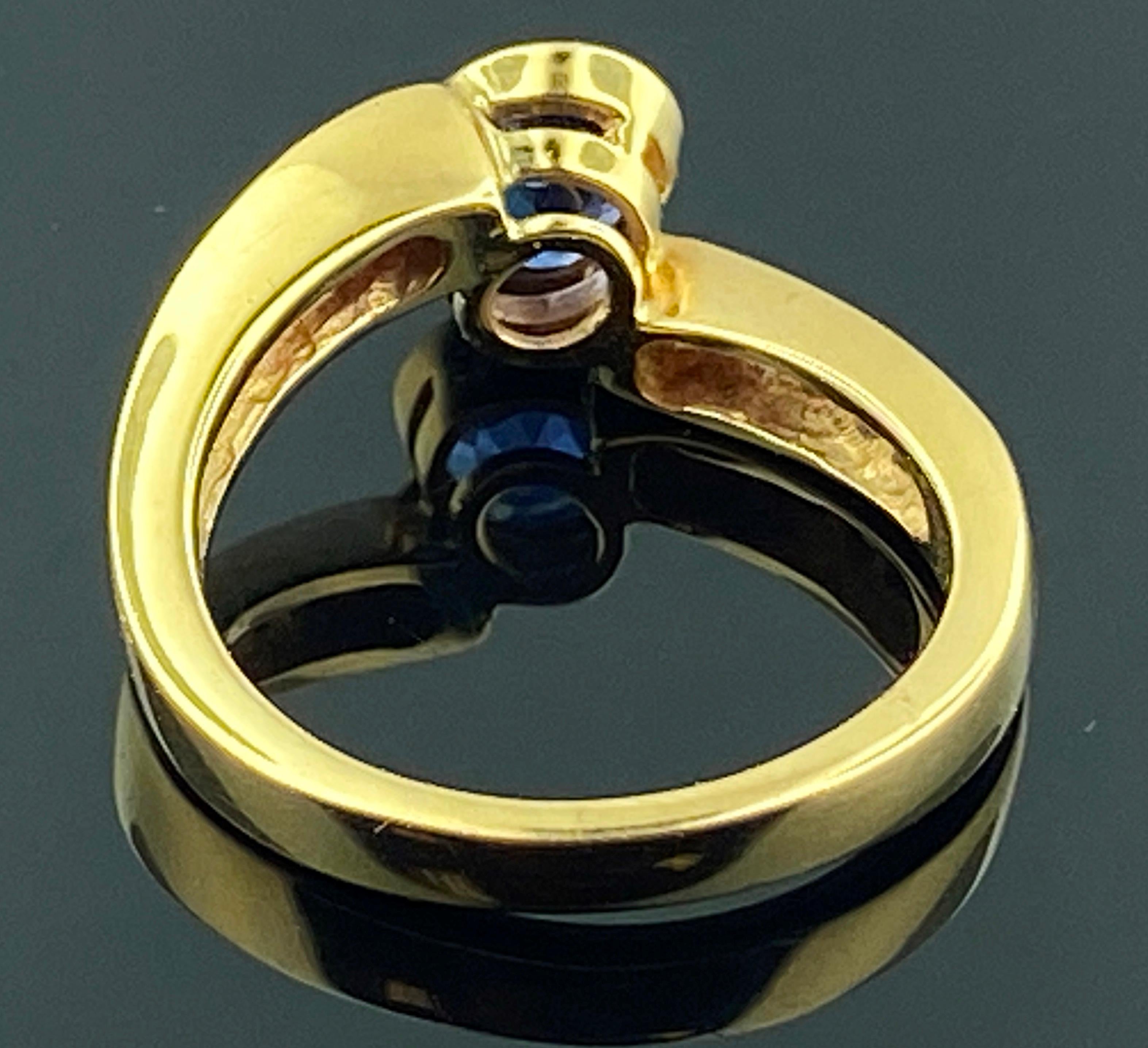 Round Cut Blue Sapphire Ring with Diamonds in 14 Karat Yellow Gold