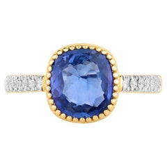 Bague en saphir bleu sertie de diamants, 2,42 carats, or jaune 18 carats