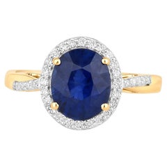 Anello con zaffiro blu e diamanti, 2,82 carati, oro giallo 18 carati