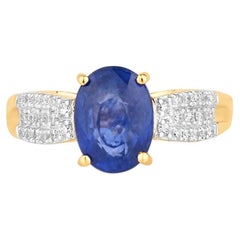 Bague en saphir bleu sertie de diamants, 2,82 carats, en or jaune 18 carats