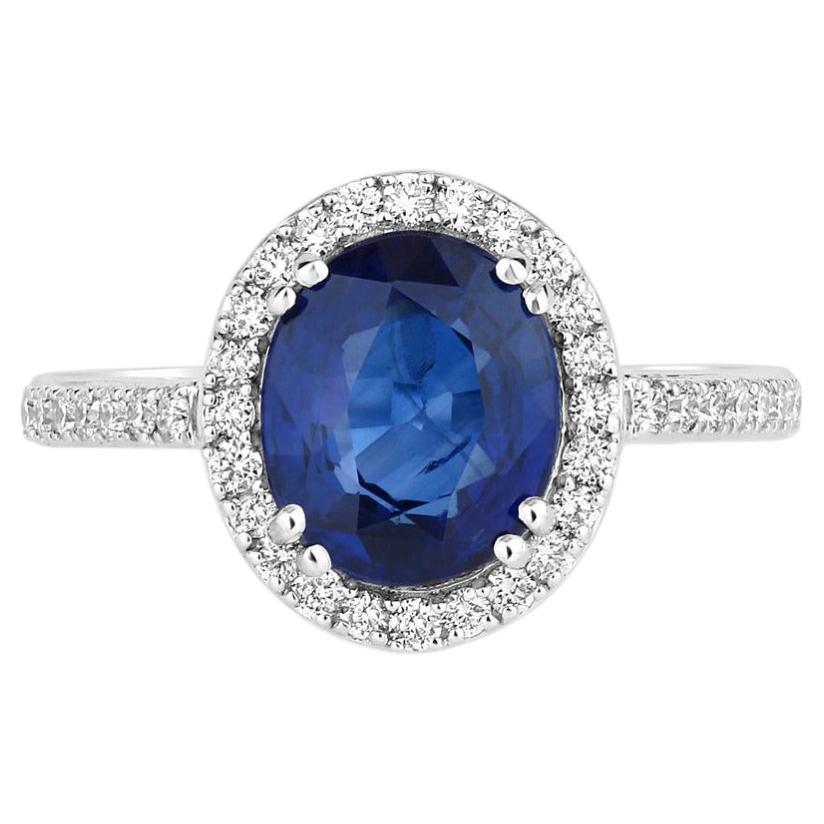 Bague en saphir bleu sertie de diamants, 3,06 carats, en or blanc 18 carats