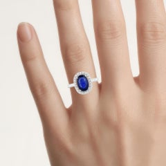 Blue Sapphire Ring With Diamonds 3.18 Carats 18K White Gold