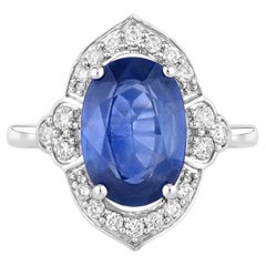 Blue Sapphire Ring With Diamonds 4.12 Carats 18K White Gold