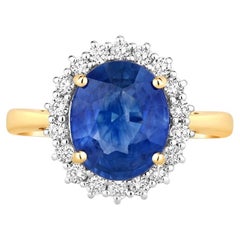 Blue Sapphire Ring With Diamonds 4.14 Carats 18K Yellow Gold