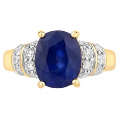Blue Sapphire Ring With Diamonds 4.22 Carats 18K Yellow Gold