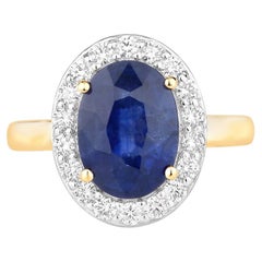 Blue Sapphire Ring With Diamonds 4.48 Carats 18K Yellow Gold