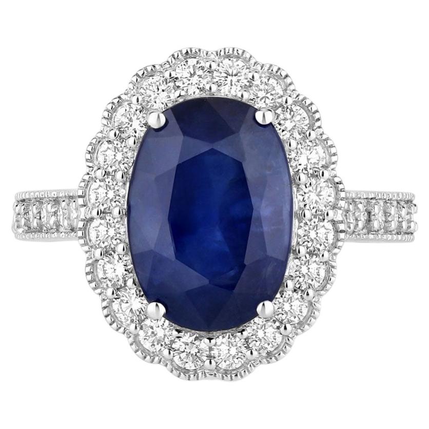 Bague en saphir bleu sertie de diamants, 5,01 carats, or blanc 18 carats