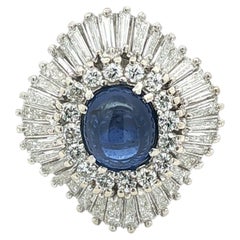 Blue sapphire ring with diamonds in 18K white gold
