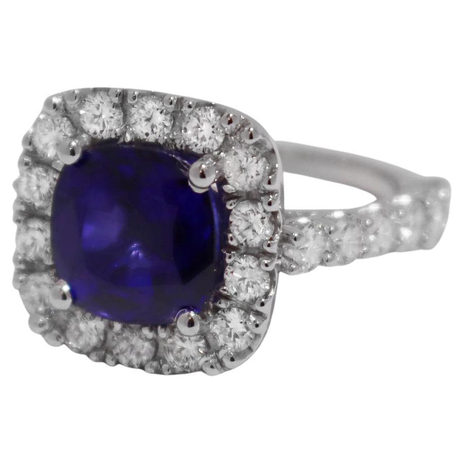 Blue Sapphire Ring with Diamonds in White Gold For Sale