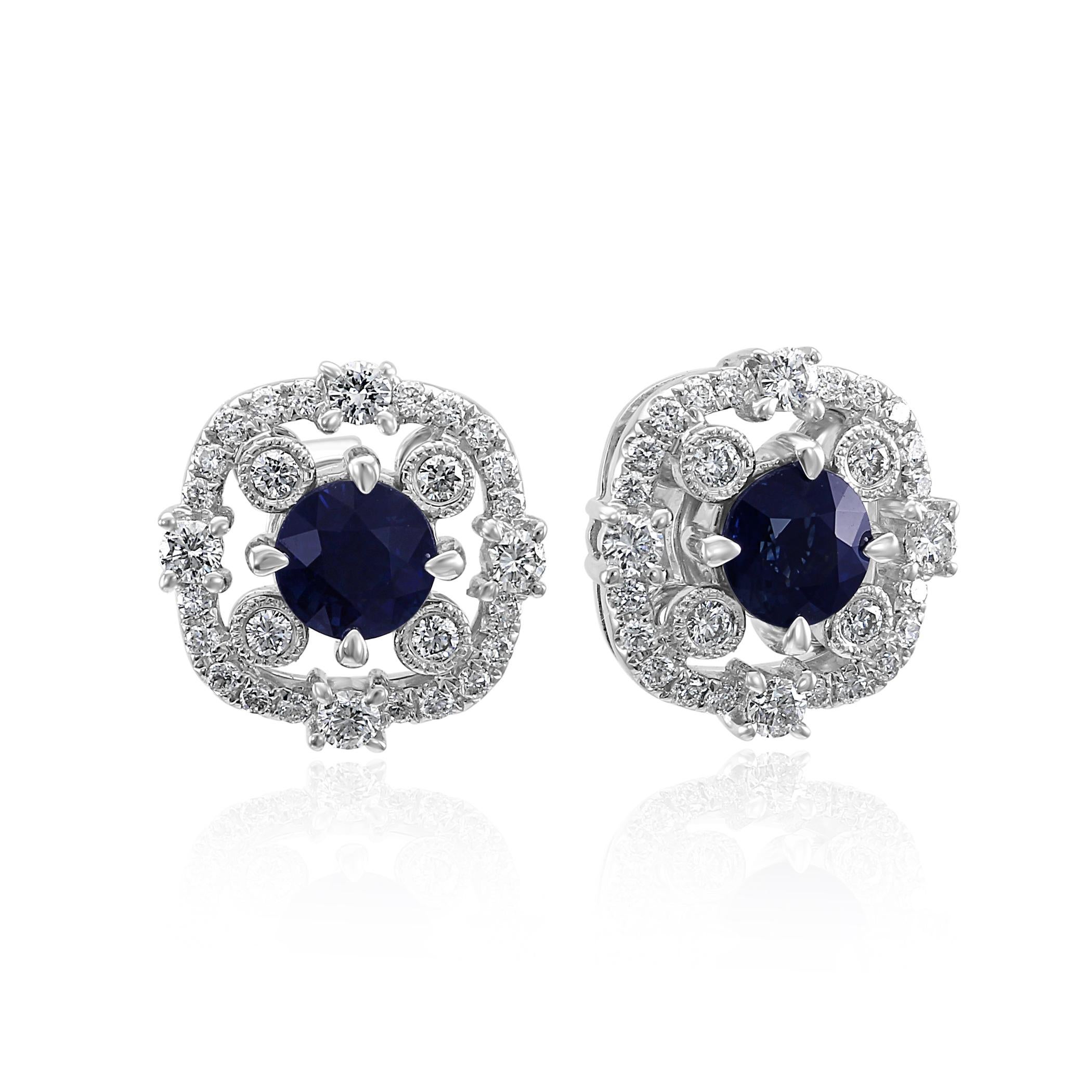 2 Gorgeous Blue Sapphire Round 1.62 Carat Encircled in Halo of 56 White Colorless VS-SI Diamond Rounds  0.66 Carats set in Gorgeous 4 Prong 18K White Gold Stud Earring.

MADE IN USA
Total Stone Weight 2.28 Carat

Style available in different price