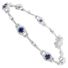 Blue Sapphire Round Diamond Halo Gold Bracelet