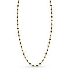 Collana rotonda con zaffiro blu in oro giallo 18K