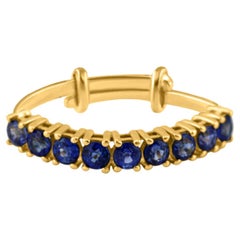 Bague ronde en or jaune 18 carats avec saphir bleu