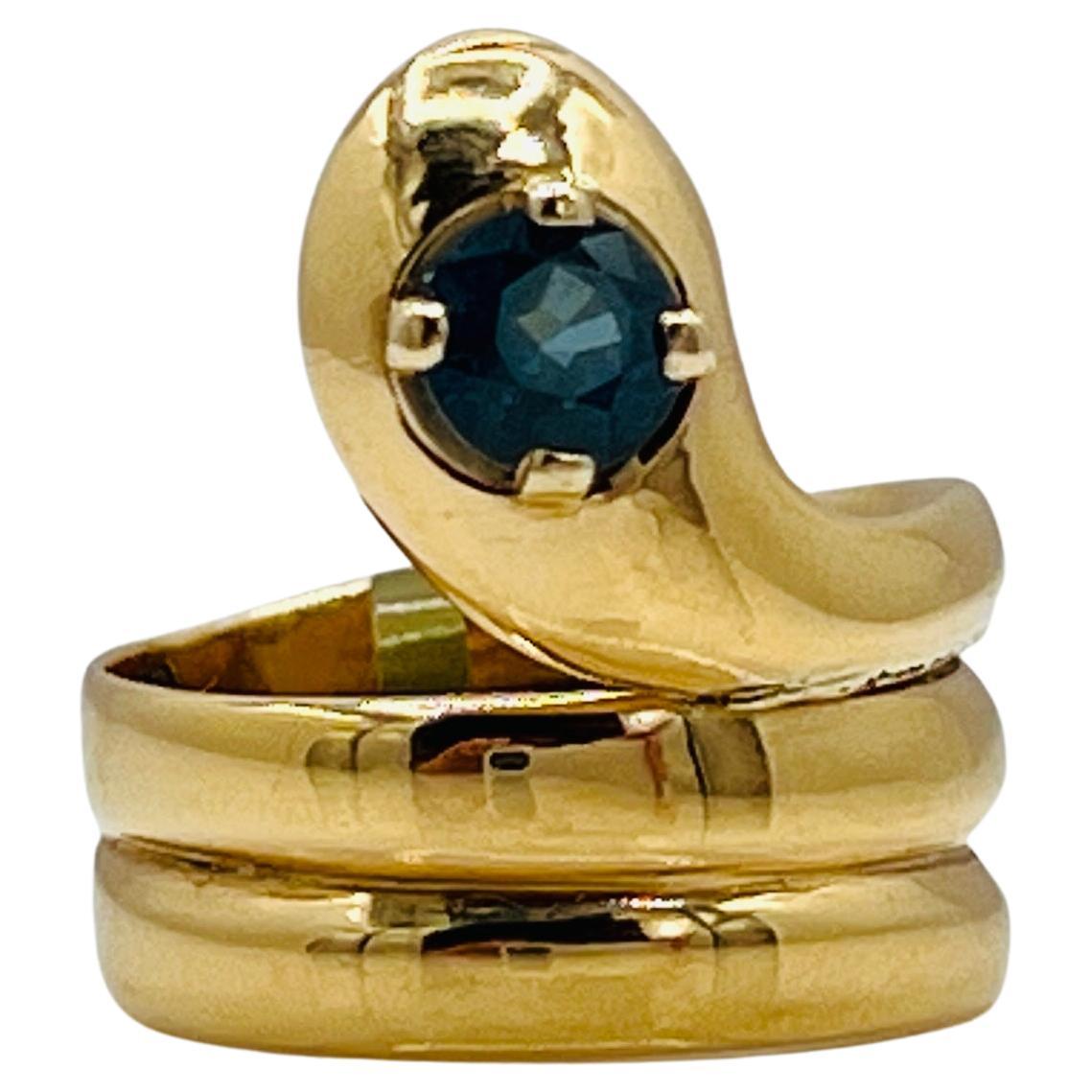 Blue Sapphire Round Snake Ring in 18K Yellow Gold For Sale