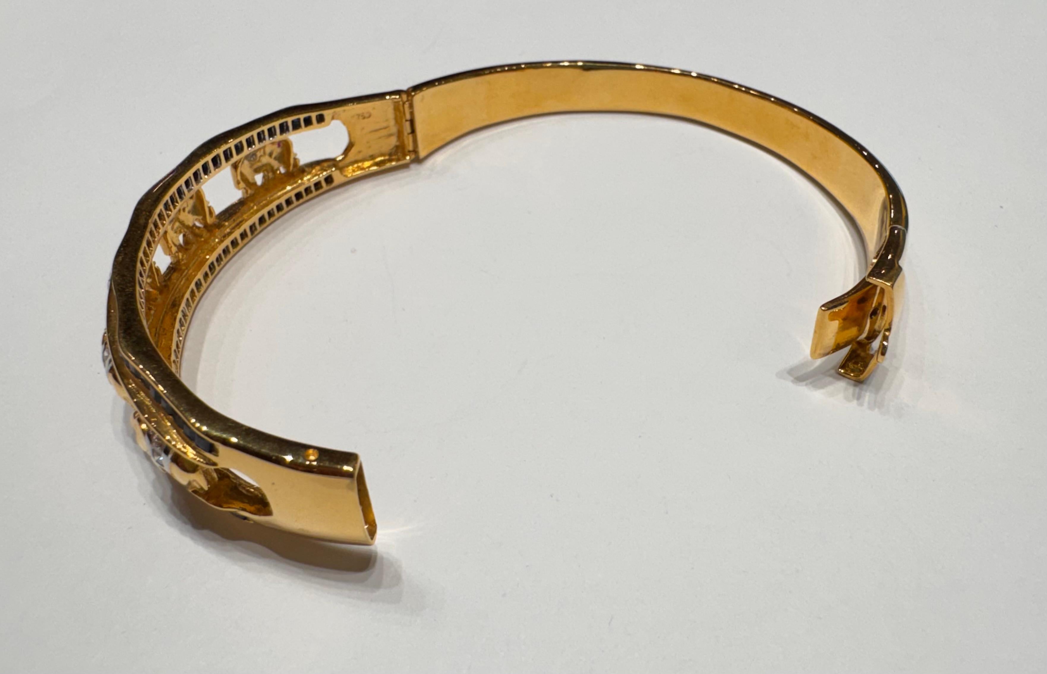 Blue Sapphire, Ruby 0.15 and Diamond Elephant Bangle set in 18K Gold Settings For Sale 8