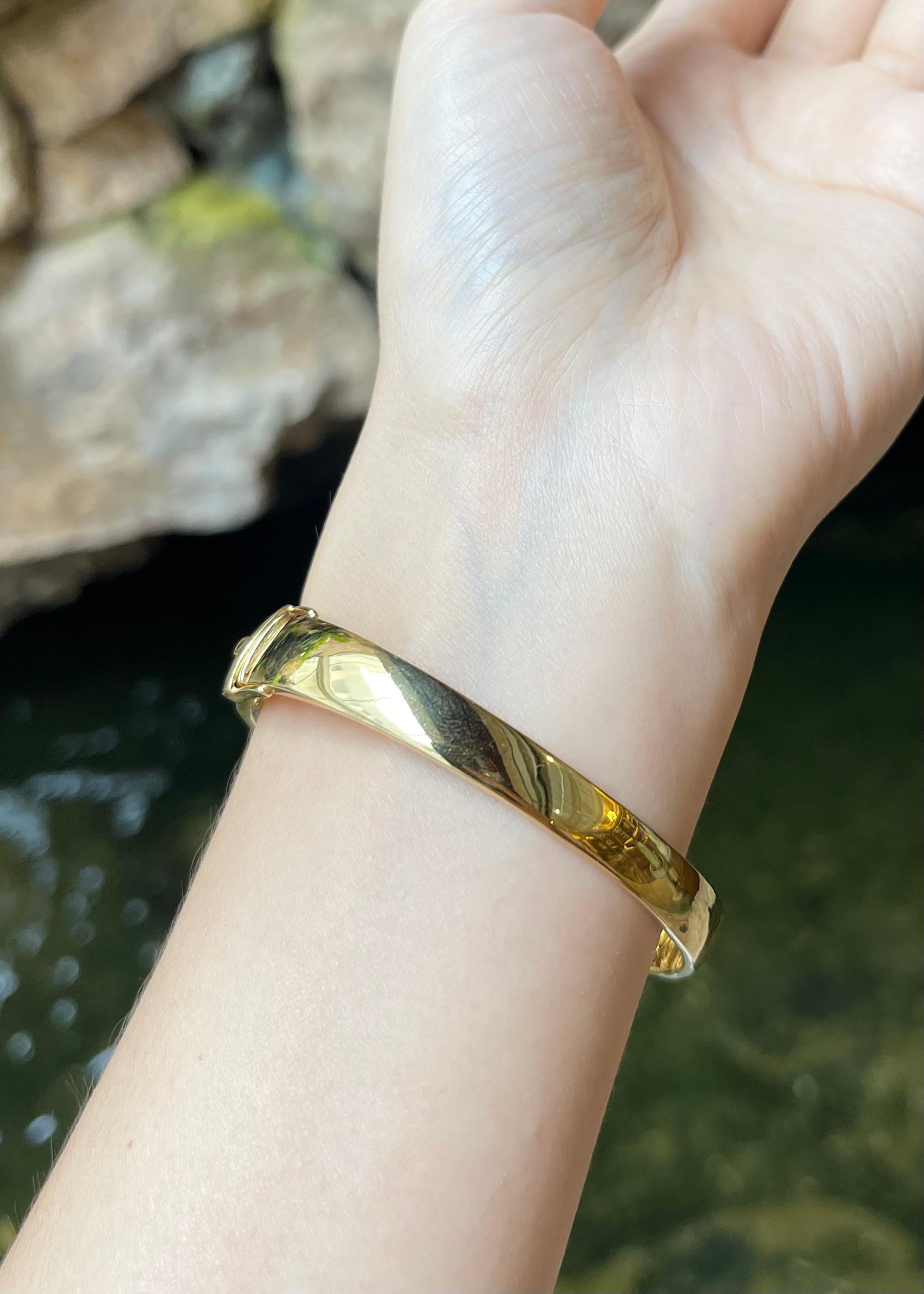 Mixed Cut Blue Sapphire, Ruby 0.15 and Diamond Elephant Bangle set in 18K Gold Settings For Sale