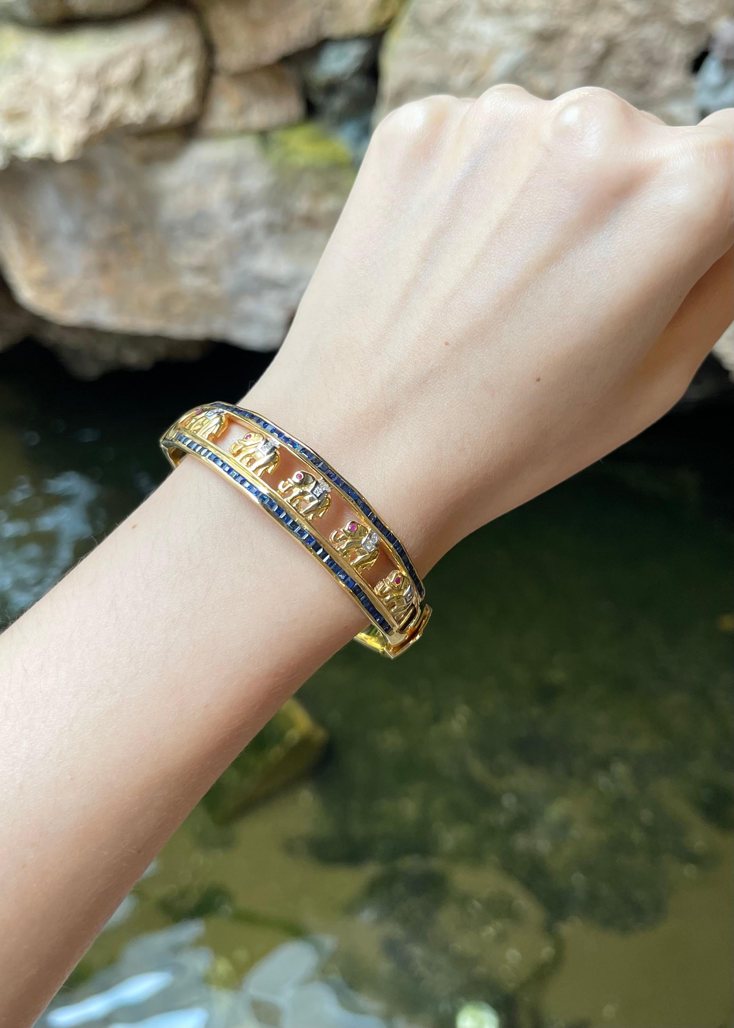 Women's Blue Sapphire, Ruby 0.15 and Diamond Elephant Bangle set in 18K Gold Settings For Sale