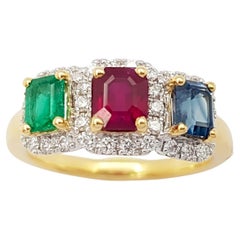 Ring mit blauem Saphir, Rubin, Smaragd und Diamant in 18 Karat Goldfassungen
