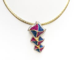 Blue Sapphire, Ruby with Diamond Rotatable Windmill Pendant in 18 Karat Gold