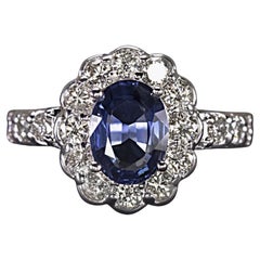 Anello da cocktail con diamante smerlato e zaffiro blu