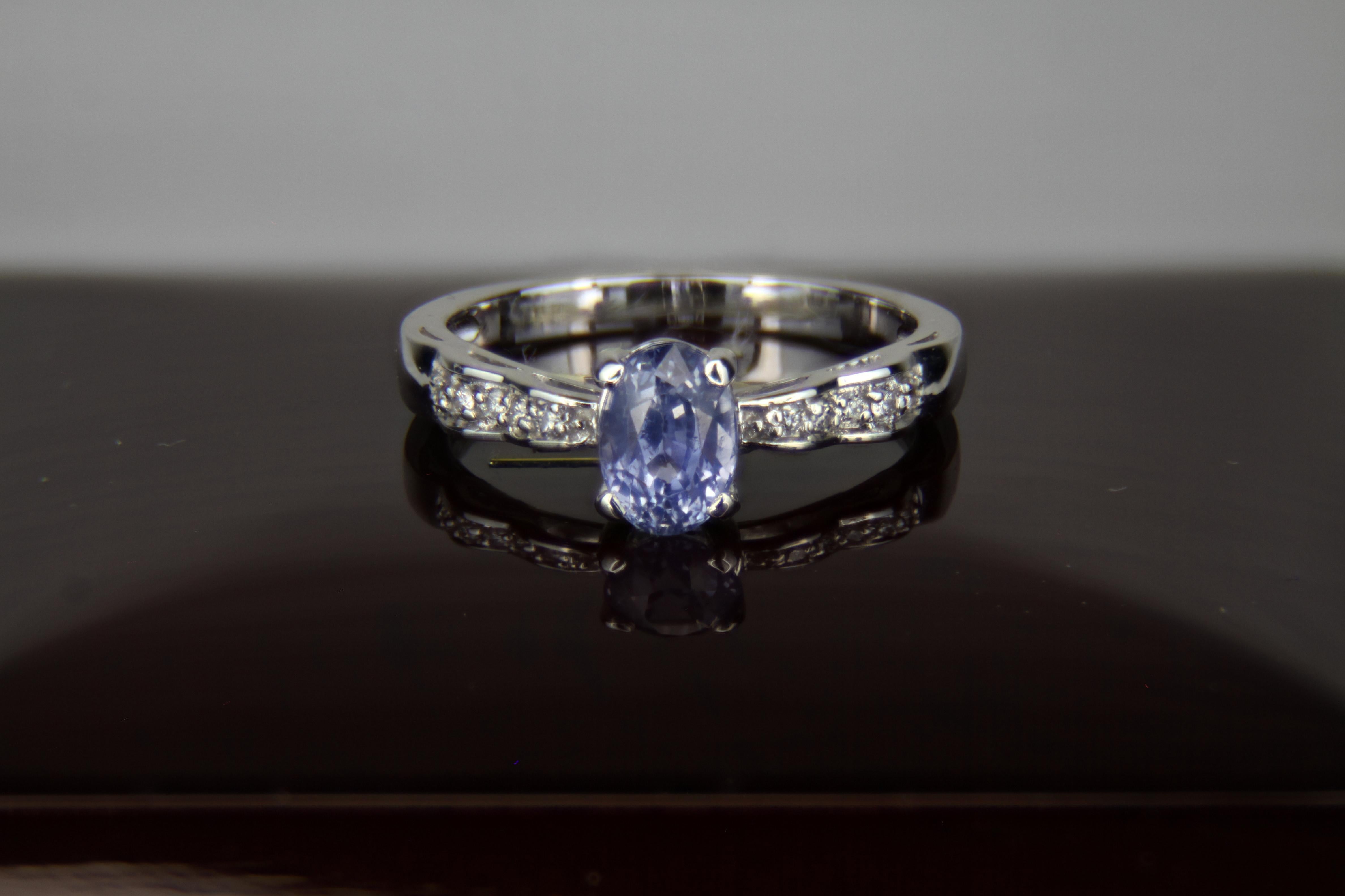 For Sale:  Blue sapphire, side diamonds 14k gold ring. 9