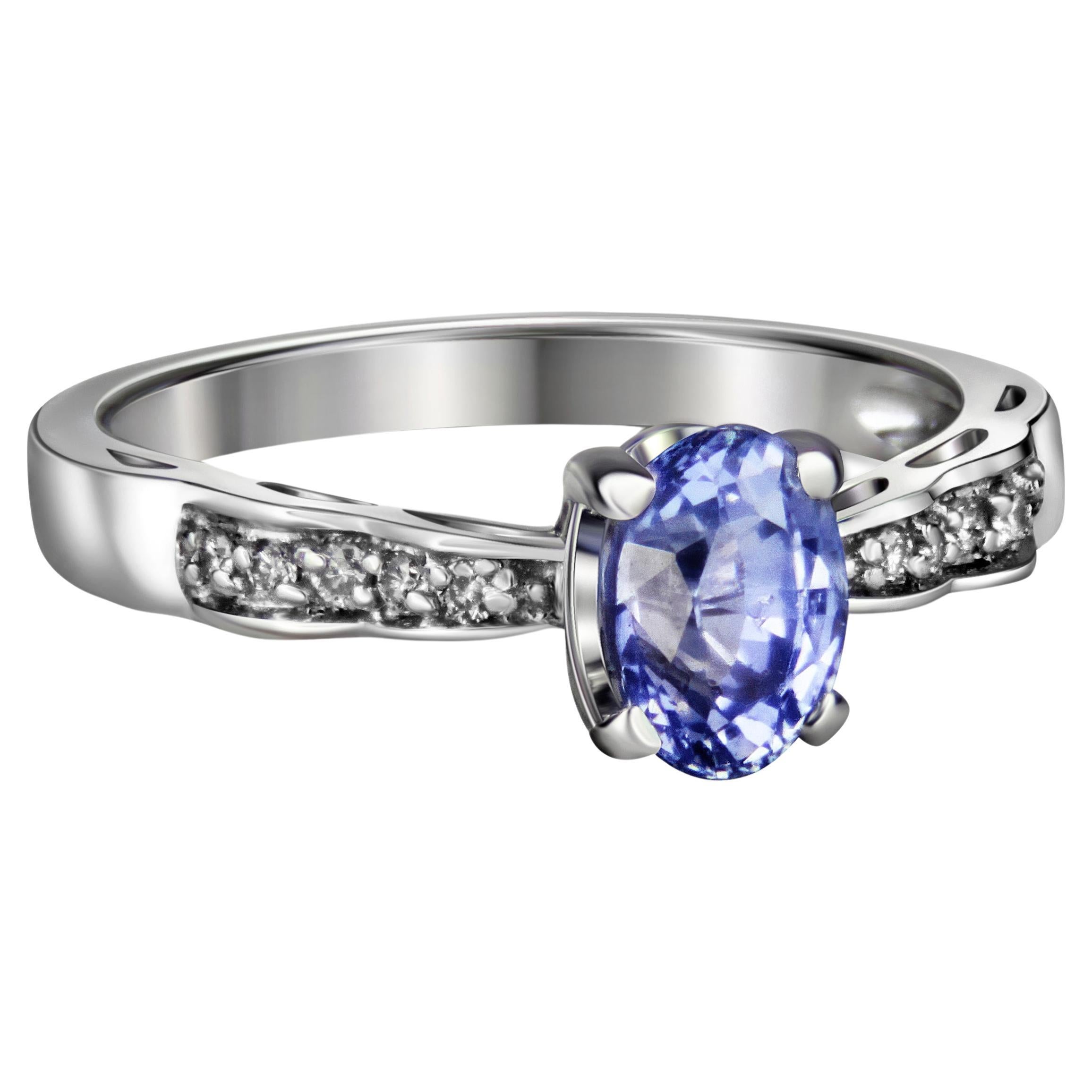 Blue sapphire, side diamonds 14k gold ring.