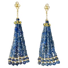 Orecchini con zaffiro blu e nappe in oro giallo massiccio 14k