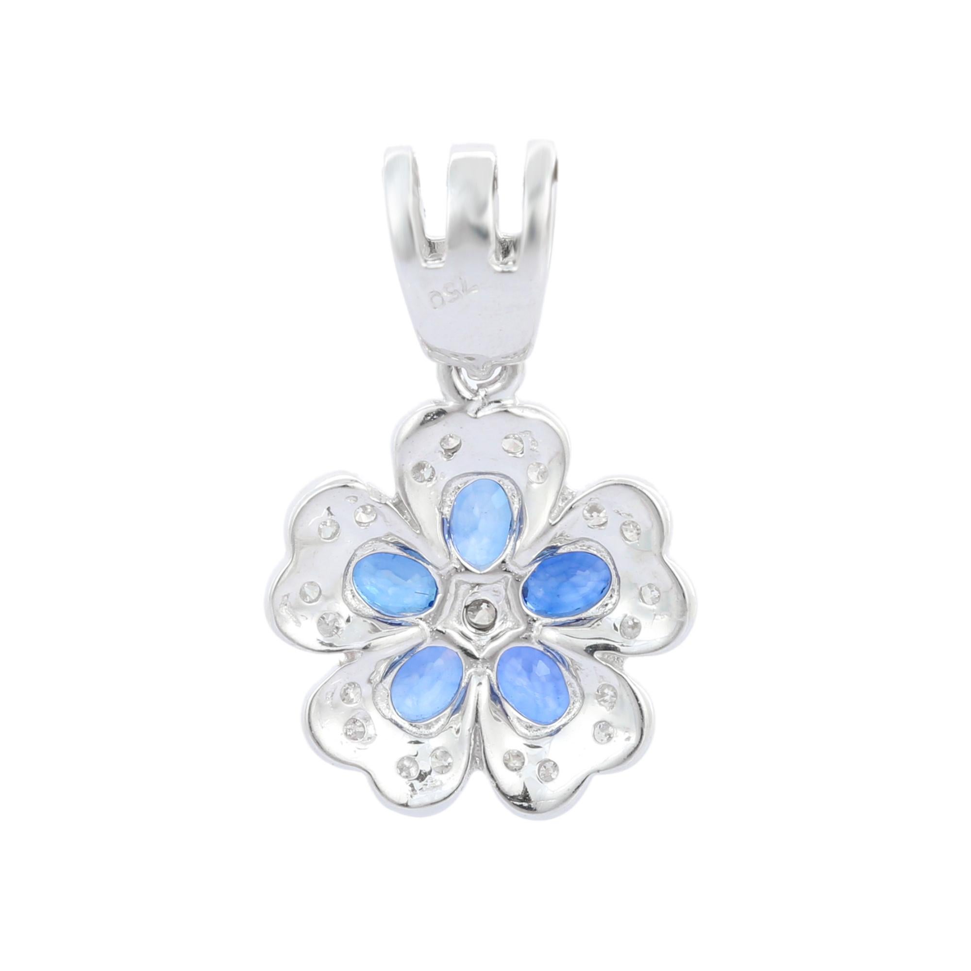Contemporary Designer Blue Sapphire Flower Pendant in 18K White Gold with Clustered Diamonds For Sale