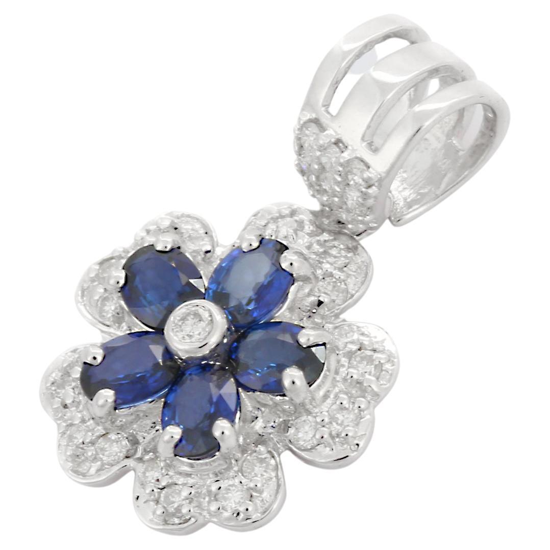 Designer Blue Sapphire Flower Pendant in 18K White Gold with Clustered Diamonds For Sale