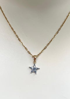 Blue Sapphire Star Pendant set in 18K Yellow/White Gold Settings