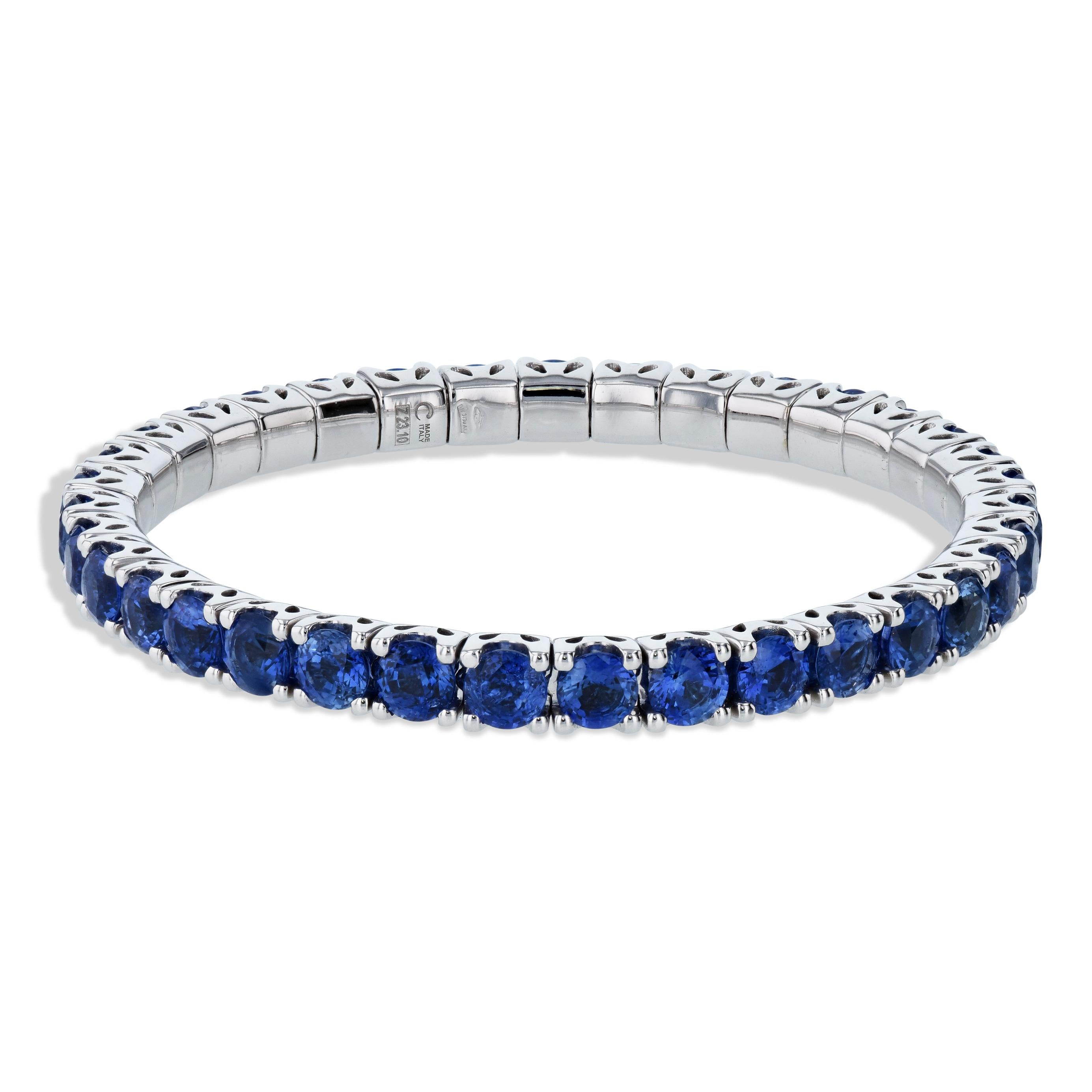 This exquisite 18 karat white gold stretch bracelet dazzles with 23.18 carats of mesmerizing blue sapphires, in a timeless and tasteful style. Enjoy the effortless on and off with its expanding stretching action. Rest assured its outstanding