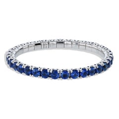 Blue Sapphire Stretchy Tennis Bracelet 18 Karat White Gold Prong Set
