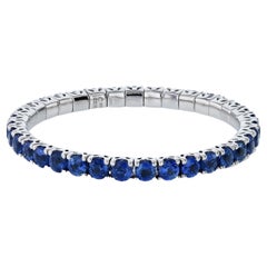 Blue Sapphire Stretchy Tennis Bracelet 18 Karat White Gold Prong Set