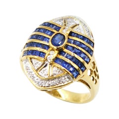 Bague ovale en or jaune 18 carats avec diamants et saphirs bleus à rayures évasées