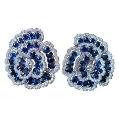 Blue Sapphire Studs Set in 18 Karat Gold with Diamonds