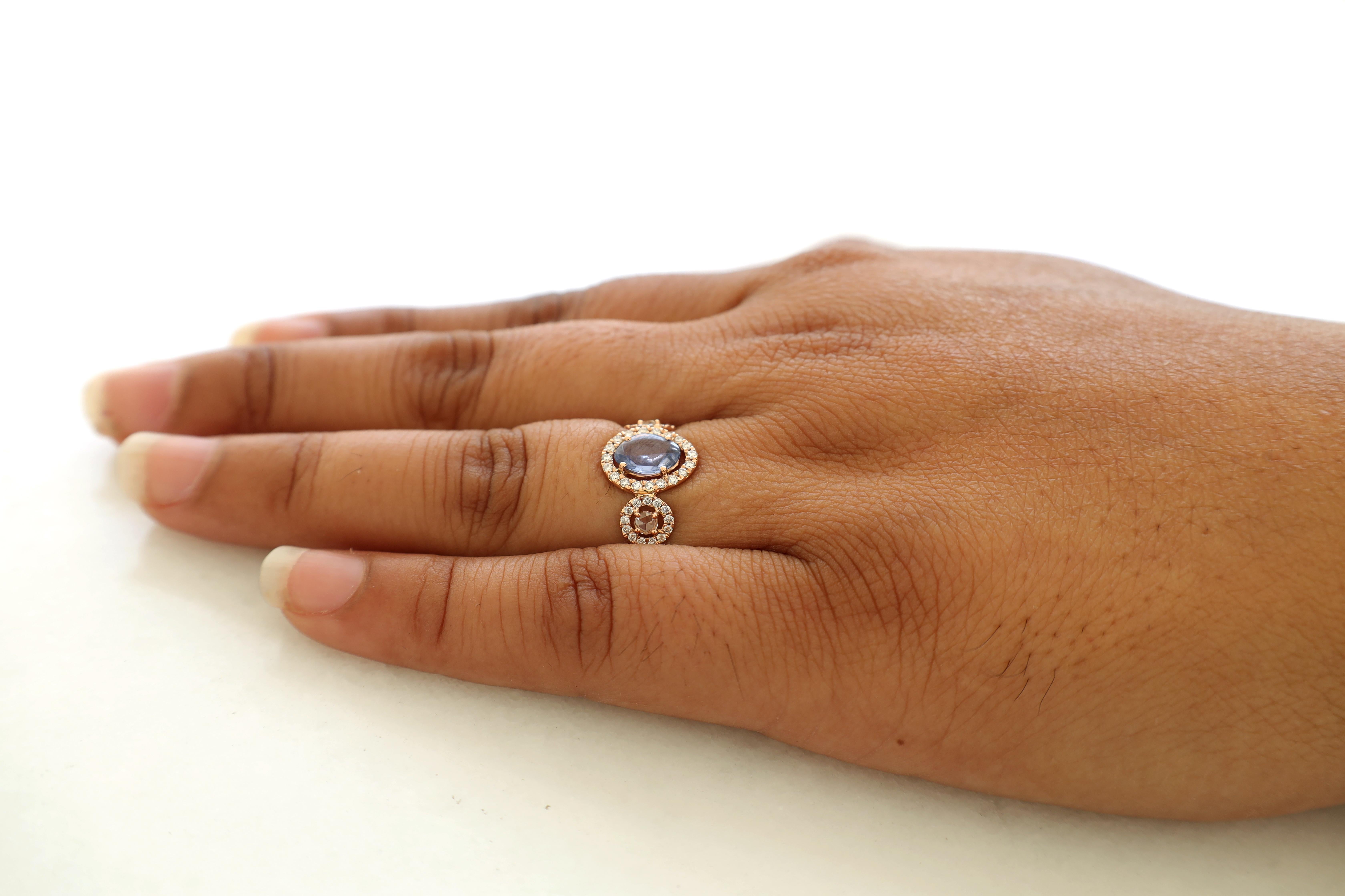 Round Cut Blue Sapphire Surrounded by Round Brilliant Cut Diamond Ring For Sale