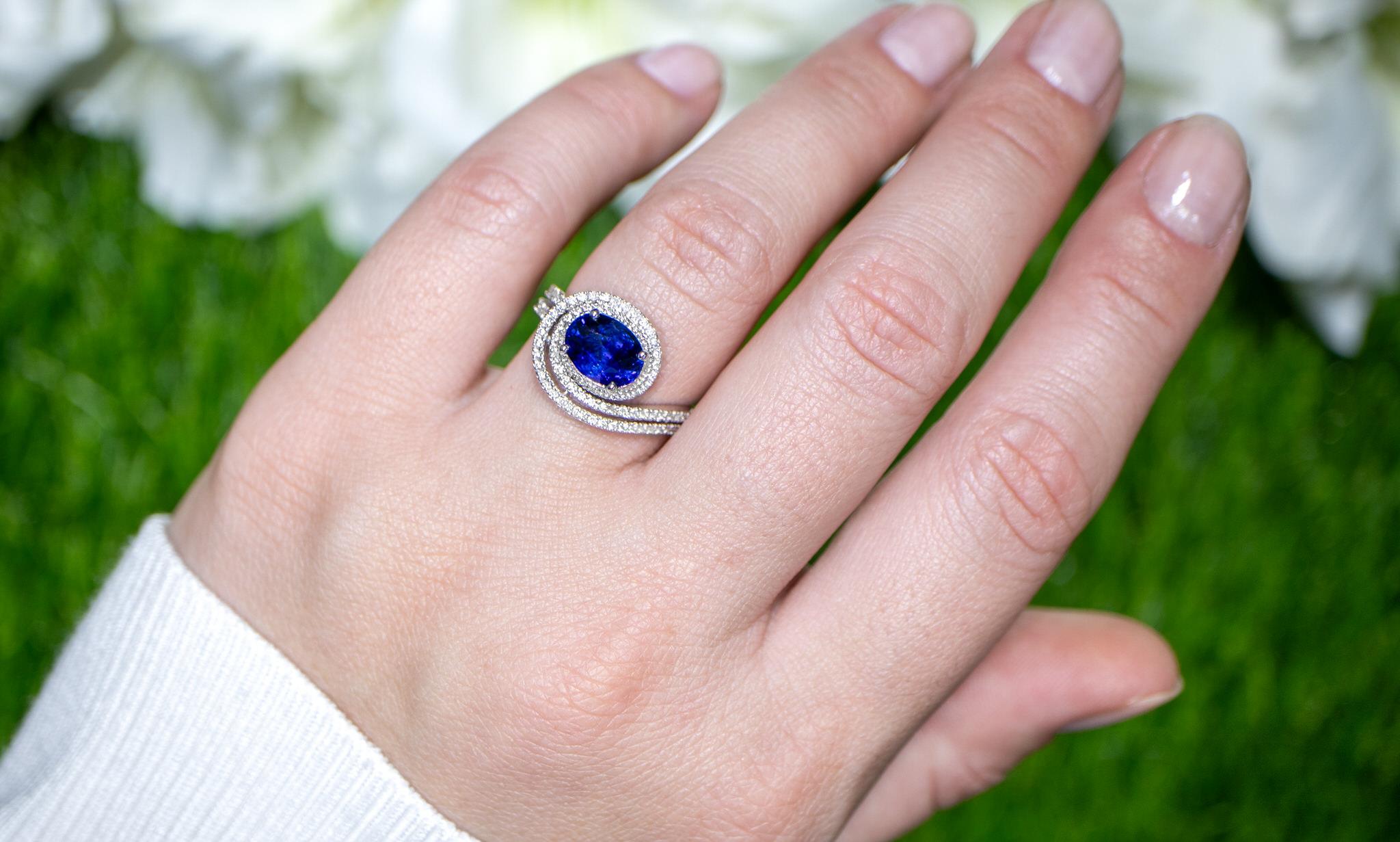 Oval Cut Blue Sapphire Swirl Ring With Diamonds 2.40 Carats 18K Gold For Sale