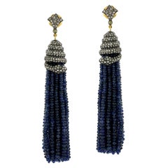 Boucles d'oreilles à pompon en saphir bleu serti de diamants pavés en forme de serpent