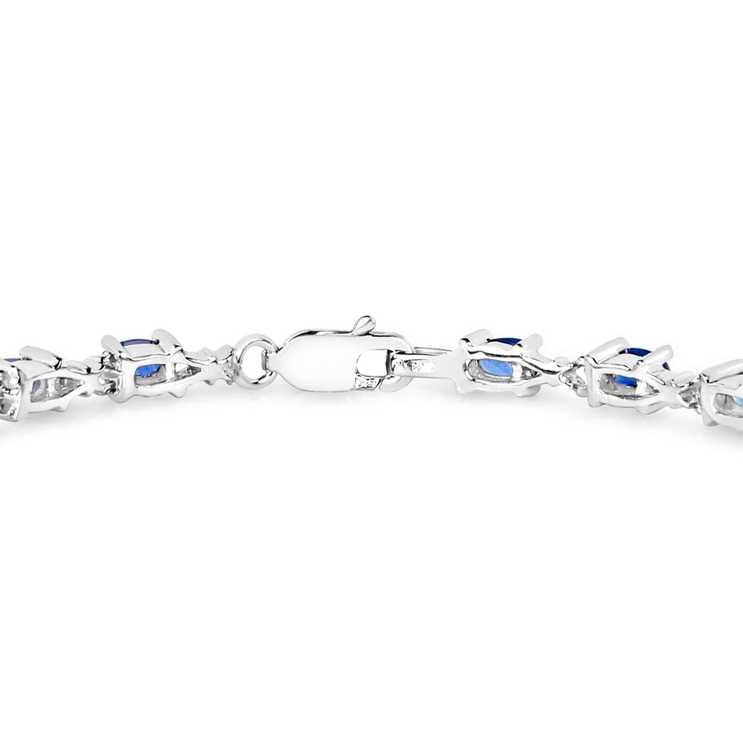 Taille ovale Bracelet de tennis en saphir bleu 4.15 carats en argent sterling en vente