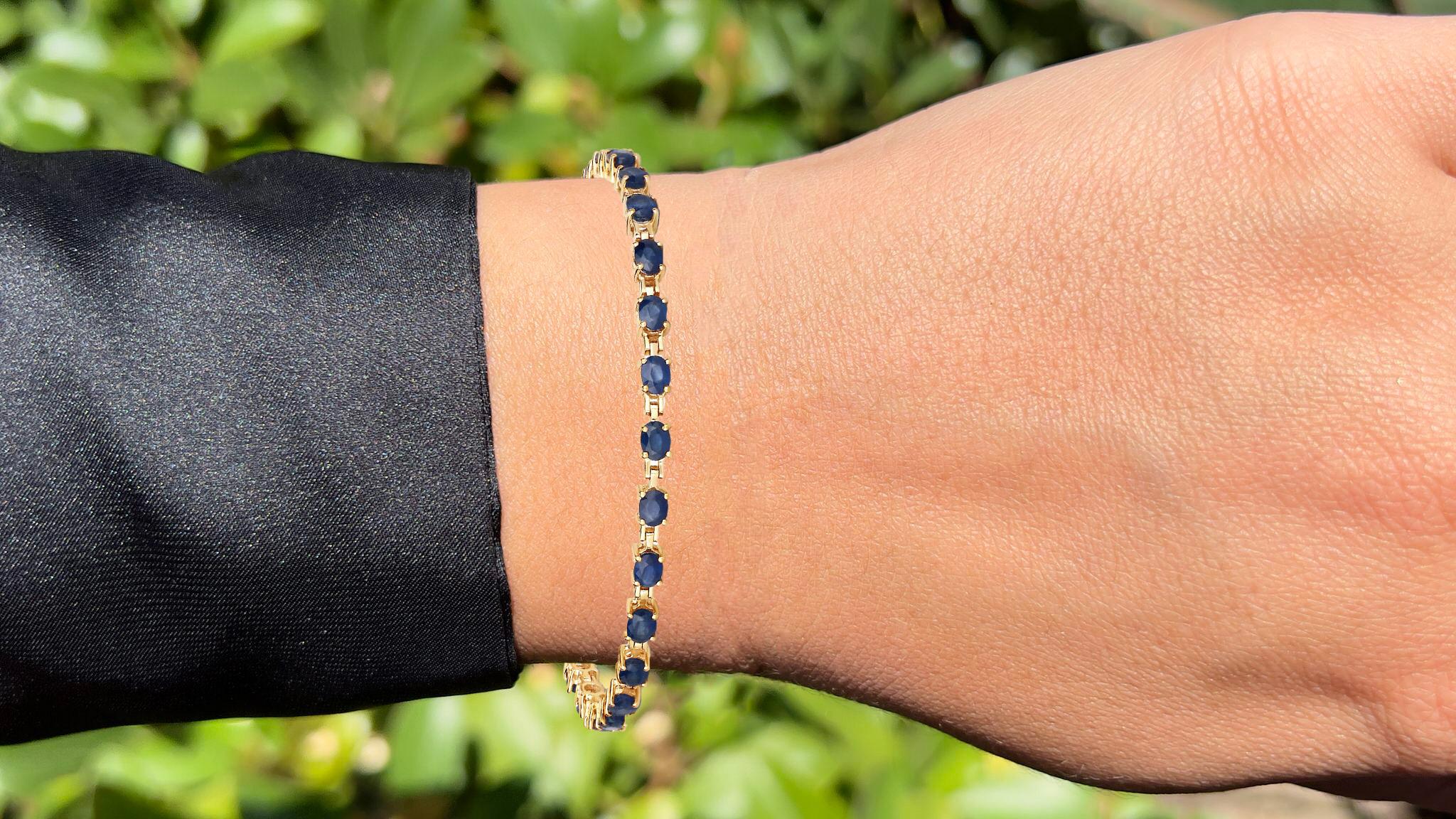 It comes with the appraisal by GIA GG/AJP
Blue Sapphire = 5.60 Carats
Cut: Oval
Total Quantity of Sapphires: 28
Metal: 14K Yellow Gold
Bracelet Length: 7 Inches