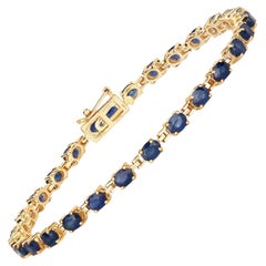 Bracelet tennis en or jaune 14 carats avec saphir bleu 5,60 carats
