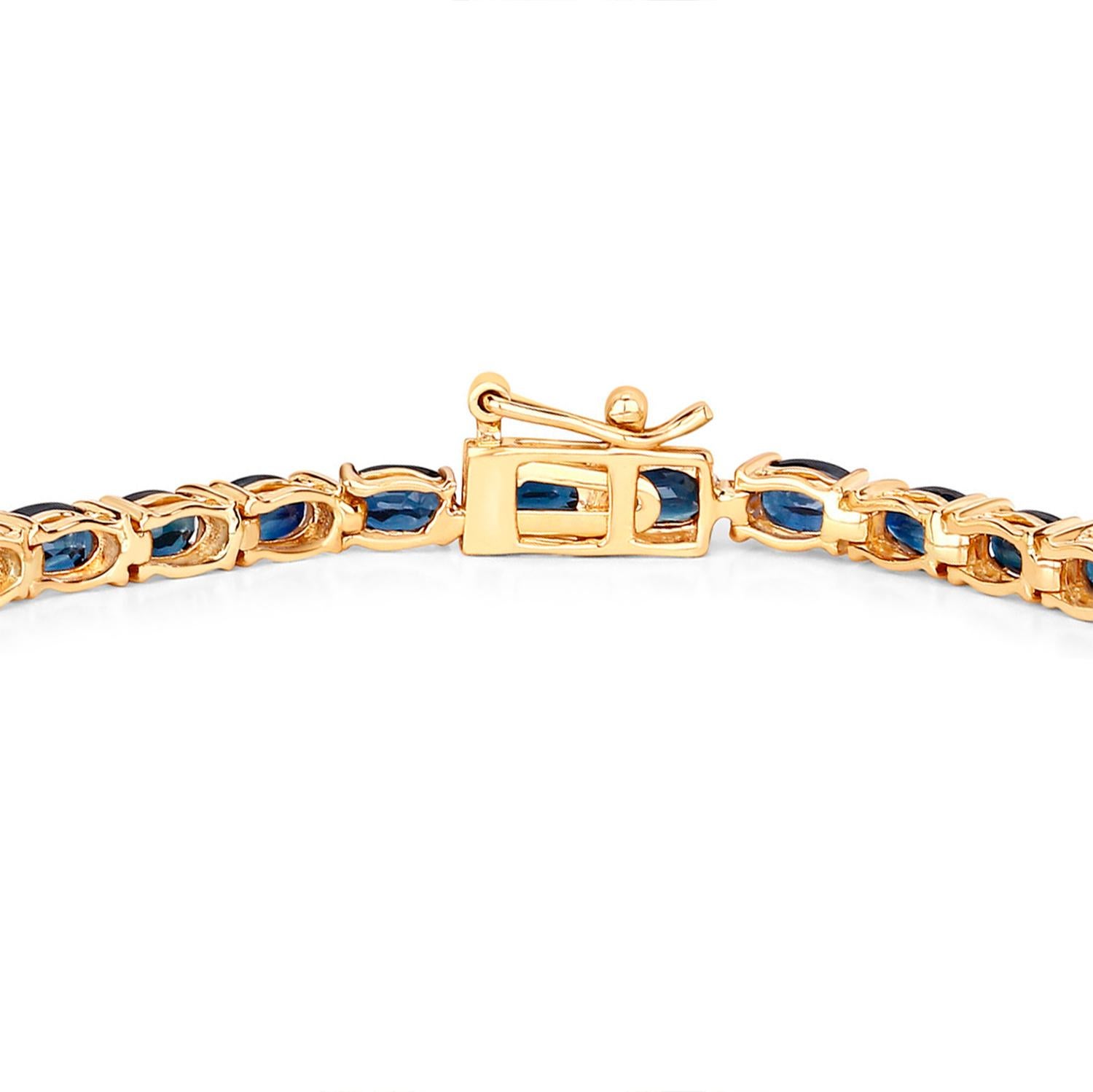 Oval Cut Blue Sapphire Tennis Bracelet 7.45 Carats 14K Yellow Gold For Sale